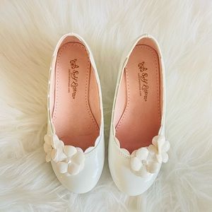 Self Esteem little girls shoes size 12. Off white with small heel. White flowers